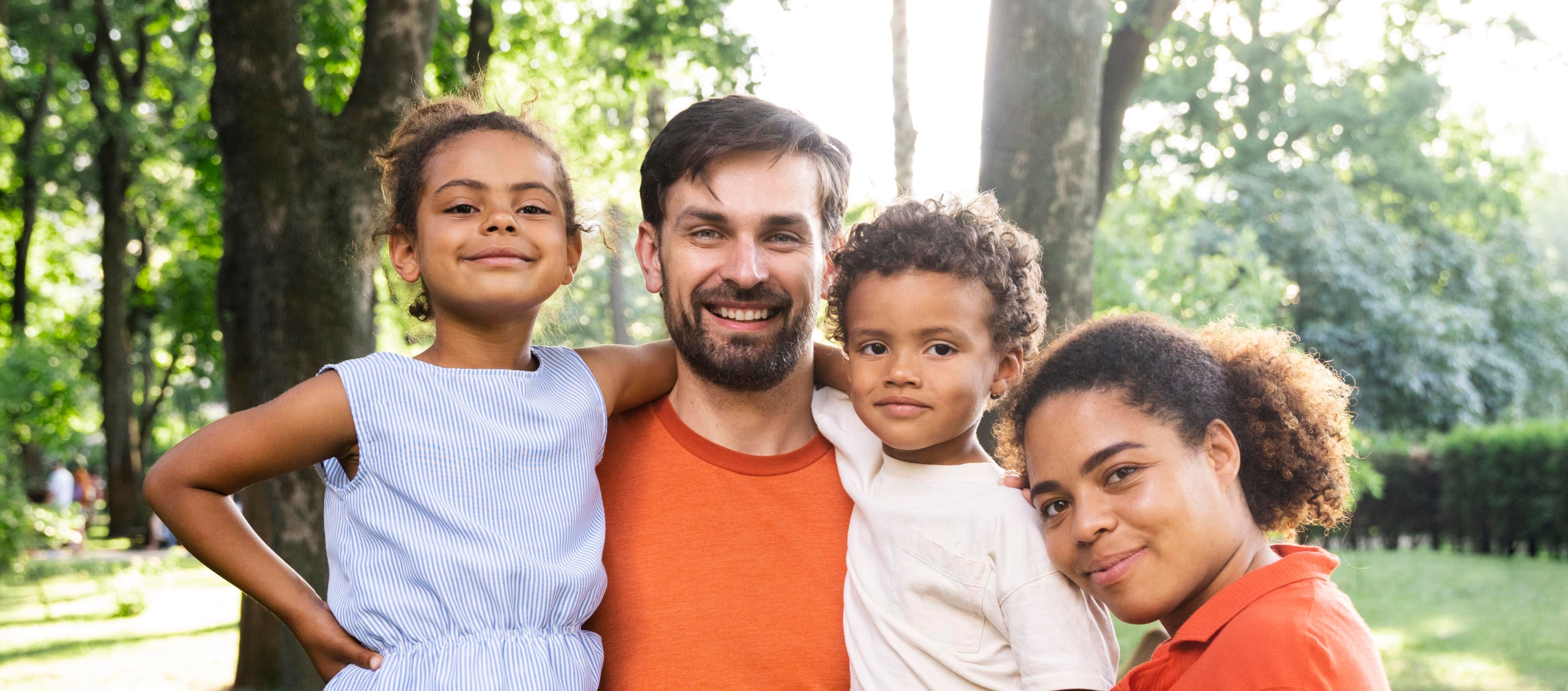 family-spending-time-together-outdoors-park happy-diverse-family