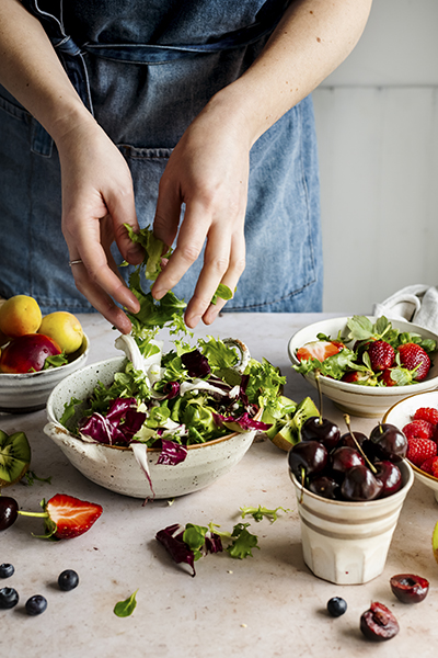 person making a salad